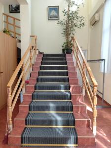 a flight of stairs in a building at Hotel Slodes in Belgrade
