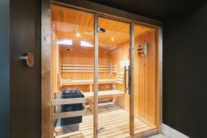 a room with a sauna with wooden walls at Bears Den in Ilkley +25 photos