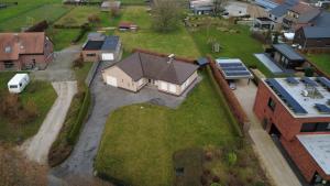 an aerial view of a house with a yard at Vakantiehuis in Vlaamse Ardennen in Zottegem