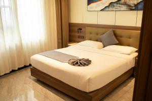 เตียงในห้องที่ Hotel EDEN +25 ภาพ