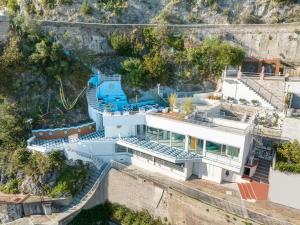 an aerial view of a house with a swimming pool at Laguna Blu in Vietri sul Mare