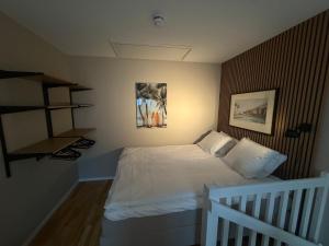 Postel nebo postele na pokoji v ubytování Stugcentralen Lägenhetshotell & Stugor + 35 fotografií