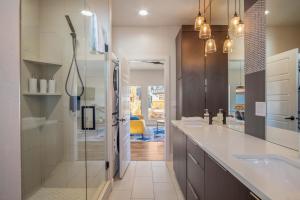 a kitchen with a sink and a counter top at Timber & Tin B 1Bed 1Bath w Pool & Rooftop Deck in Kanab
