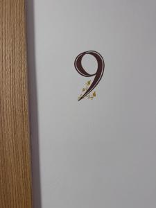 a phone with the number two on the screen at Einzelzimmer 9 in Heidenheim