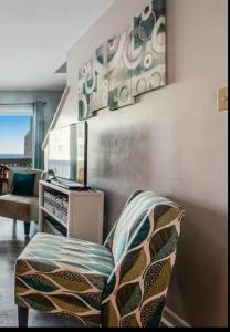 a living room with a couch and a chair at Fort Morgan Townhomes E7 in Fort Morgan