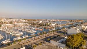 an aerial view of a marina with boats in the water at Penthouse by the Marina in Lagos