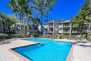 an image of a swimming pool at a apartments at Harbour Town Haven in Hilton Head Island +42 photos