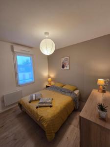a bedroom with two beds and a large window at Eden lodge Chessy - 10min Disneyland - Parking in Chessy