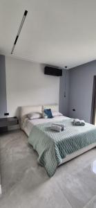 a bedroom with two beds in a room at Luxury Villa in Calabria in Gasponi +11 photos