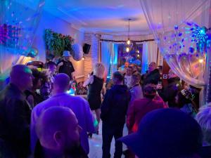 a crowd of people dancing in a party at The Dame Lane in Blackpool