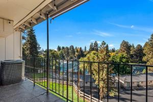 a balcony with a view of a street at Updated Condo with Deschutes River View in Bend +34 photos