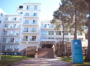 a building with a sign in front of it at BLUESEA Costa Verde in El Arenal