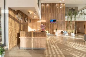 a lobby with a reception desk in a building at Liyu Hotel Apartment in Addis Ababa