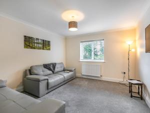 a living room with a couch and a window at Dawson Park 9 - Uk12668 in Mablethorpe