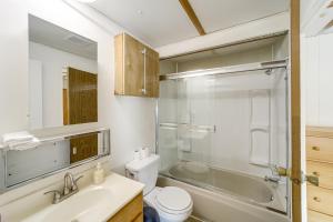 a bathroom with a toilet and a sink and a shower at Walk to Loop Trail! East Wenatchee Basecamp in East Wenatchee +18 photos