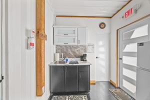a kitchen with a sink and a counter top at Beachside 1BR Apartment Sleeps 4 in Vega Baja