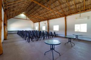 a large room with tables and chairs in it at Hotel Arena Beach Cartagena in Cartagena de Indias +81 photos