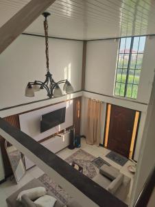 an overhead view of a living room with a tv at Optimum Apartments in Providence