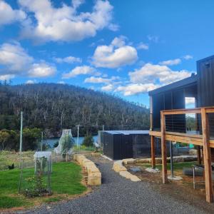 a house with a view of a mountain at Prosser River view from Paradise in Orford