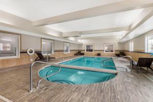 a pool in a hotel room with at Comfort Inn Ballard-Roosevelt in Roosevelt