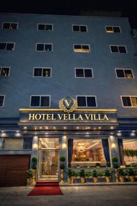 a hotel with a sign that reads hotel villella at Airport Hotel Vella VILLA By Corporate Group Delhi IGI Airport Terminal 3 With Free Airport Pickup in New Delhi