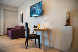 TV/Unterhaltungsangebot in der Unterkunft Almaas Hotell Stord AS