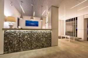 Ο χώρος του λόμπι ή της ρεσεψιόν στο Relux Ios Hotel