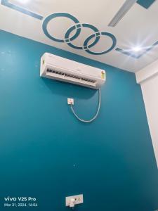 a wii system hanging from the ceiling in a room at RK Residency in Ayodhya