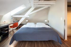 Voodi või voodid majutusasutuse Altstadt Hotel toas