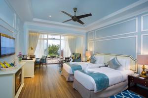 Voodi või voodid majutusasutuse Fragrant Nature Munnar - A Five Star Classified Hotel toas