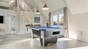 a large room with a pool table in it at Villavilla 182 - Rømø, Sydjylland in Høm