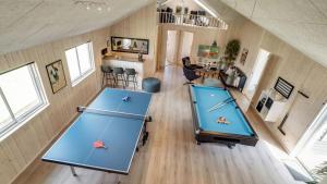 two ping pong tables in a ping pong room at Villavilla 451 - Grenå Strand, Østjylland in Grenå