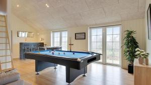 a large room with a pool table in it at Villavilla 386 - Ebeltoft, Østjylland in Ebeltoft