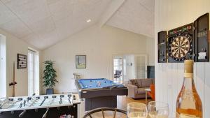 a room with a pool table and a dart board at Villavilla 386 - Ebeltoft, Østjylland in Ebeltoft +11 photos