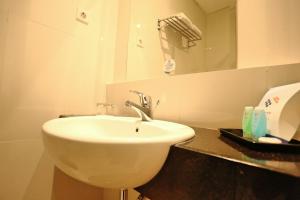 Koupelna v ubytování Pasar Baru Square Hotel Bandung + 20 fotografií