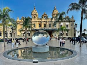 a large ball in front of a building at Gamiga in Menton