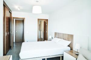Ein Bett oder Betten in einem Zimmer der Unterkunft Luxury Apartment Las Terrazas