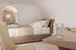 Postel nebo postele na pokoji v ubytování Elite Luxury Suites