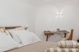 Postel nebo postele na pokoji v ubytování Elite Luxury Suites