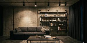 a living room with a couch and a table at Zefir Apart in Ordu