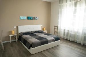 a bedroom with a bed and a large window at Casa Mirella in Cavallino-Treporti +34 photos
