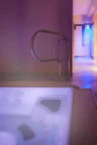 Koupelna v ubytování Hotel Arnolfo & Aqua Laetitia Spa & Beauty