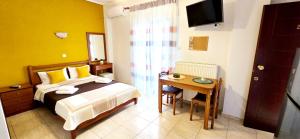 Un pat sau paturi într-o cameră la Anna Rooms