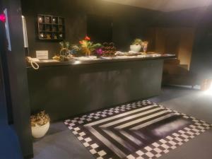 a room with a counter with potted plants on it at RESORT HOTEL Ka (Adult Only) in Chosei
