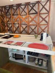 a kitchen with a counter with food on it at Casa das Tertúlias in Leiria +42 photos