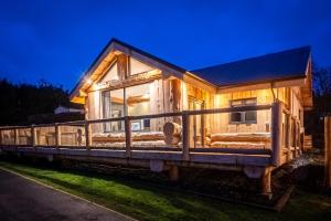 a tiny house sitting on top of a train at The Farmhouse in Ilkley
