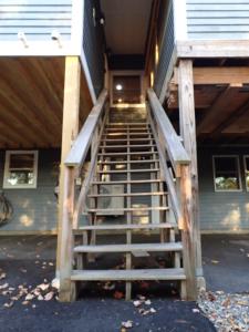 a set of stairs leading up to a building at Private White Mountains Guest Suite - Welcome! in Littleton