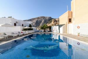 a swimming pool with a shark painted on it at Iris Boutique Hotel in Kamari