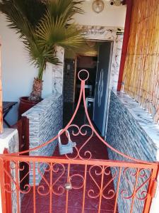 a sign on the balcony of a restaurant at Sidi boulfdyl in Tiznit