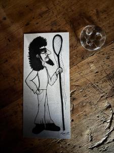 a drawing of a man holding a tennis racket at Maison d'hôtes des Mondfänger in Meisenthal